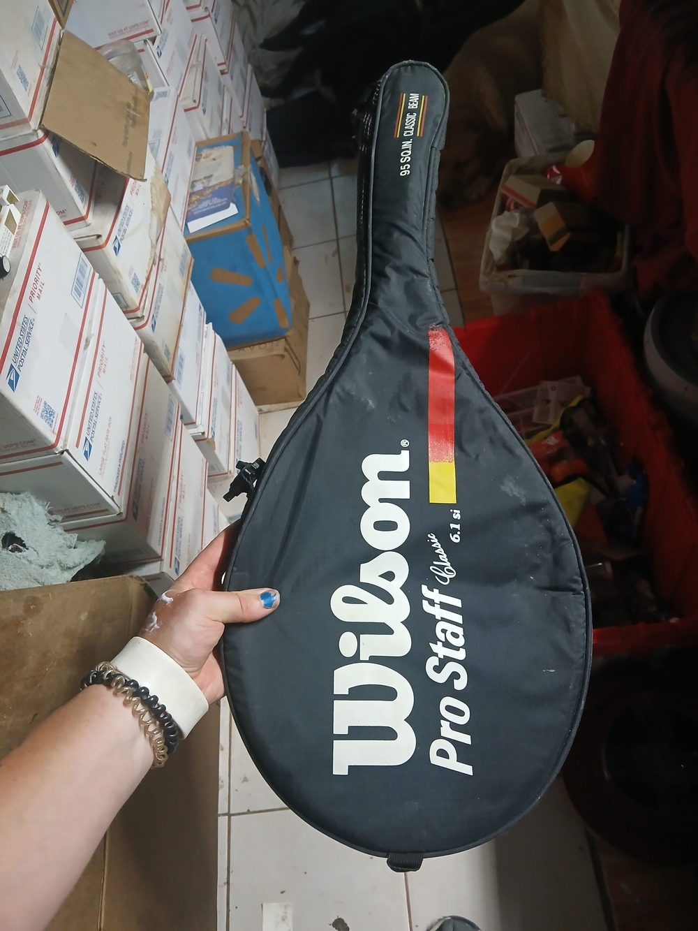 red and white Wilson US Open Junior Tennis Racquet With Case